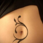 Фото женской тату на животе 16.11.2020 №088 -Female tattoo on her stomach- tatufoto.com