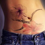 Фото женской тату на животе 16.11.2020 №168 -Female tattoo on her stomach- tatufoto.com