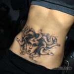 Фото женской тату на животе 16.11.2020 №189 -Female tattoo on her stomach- tatufoto.com