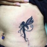 Фото женской тату на животе 16.11.2020 №191 -Female tattoo on her stomach- tatufoto.com