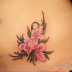 Фото женской тату на животе 16.11.2020 №196 -Female tattoo on her stomach- tatufoto.com