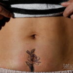 Фото женской тату на животе 16.11.2020 №203 -Female tattoo on her stomach- tatufoto.com