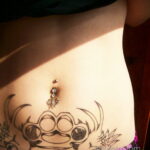 Фото женской тату на животе 16.11.2020 №236 -Female tattoo on her stomach- tatufoto.com
