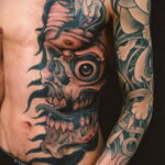 Фото крутого мужского рисунка тату 15.11.2020 №253 -cool man tattoo- tatufoto.com