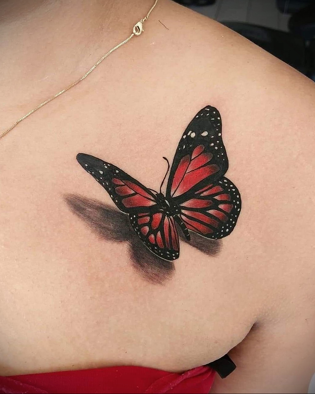 3d butterfly on chest tattoo
