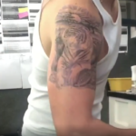 Джастин Тимберлейк продемонстрировал крутую татуировку с тигром на плече - фото 2