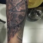 Фото тату часы и лев 19.01.2021 №0041 -lion clock tattoo-tatufoto.com