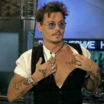 тату Джонни Деппа имя дочери - Johnny Depp's daughter's name tattoo 3