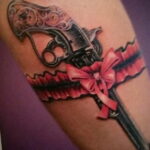 тату револьвер на бедре 16.02.2021 №0041 - revolver tattoo on hip - tatufoto.com