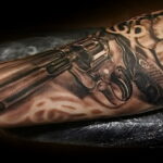 тату револьвер на руке 16.02.2021 №0016 - revolver tattoo on arm - tatufoto.com