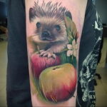 Пример женской тату с яблоком 03.03.2021 №004 - girl with apple tattoo - tatufoto.com