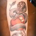 Пример тату с яблоком и змеей 03.03.2021 №020 - snake with apple tattoo - tatufoto.com