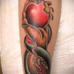 Фото татуировки с яблоком 03.03.2021 №004 - apple tattoo - tatufoto.com