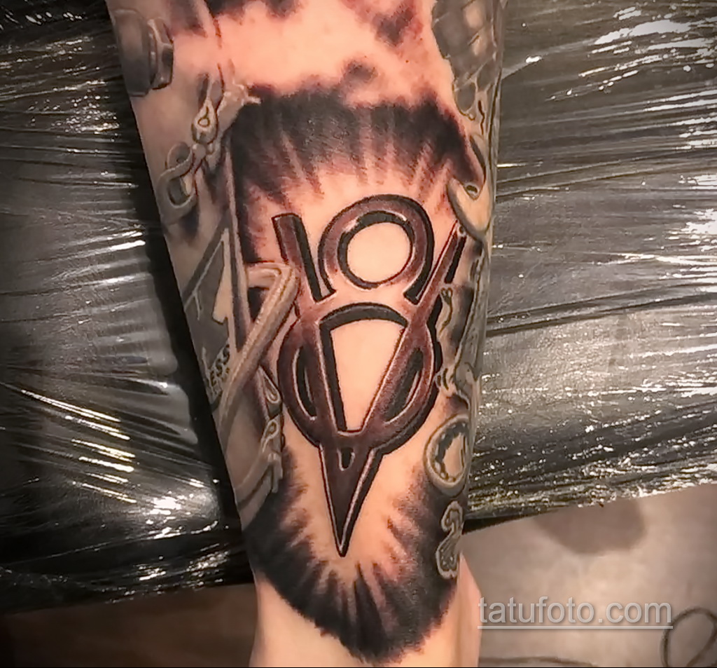 Фото интересного рисунка татуировки 04.04.2021 №057 - cool tattoo - tatufoto.com