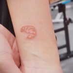 Фото татуировки круассан 05.06.2021 №001 - croissant tattoo - tatufoto.com