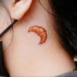 Фото татуировки круассан 05.06.2021 №031 - croissant tattoo - tatufoto.com