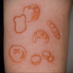 Фото татуировки круассан 05.06.2021 №039 - croissant tattoo - tatufoto.com