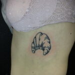 Фото татуировки круассан 05.06.2021 №095 - croissant tattoo - tatufoto.com