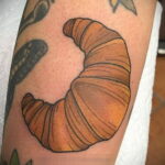 Фото татуировки круассан 05.06.2021 №125 - croissant tattoo - tatufoto.com