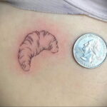 Фото татуировки круассан 05.06.2021 №135 - croissant tattoo - tatufoto.com