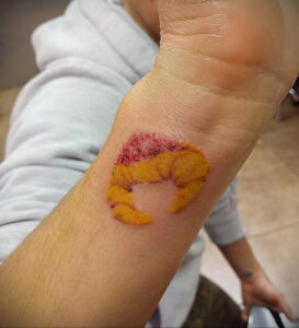 Фото татуировки круассан 05.06.2021 №142 - croissant tattoo - tatufoto.com