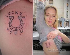 Фото татуировки на боку с изображением подковы и надписи 'Lucky You'. Простой и элегантный рисунок татуировки.