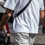 Тату бабочка на шее и тату сороконожка с мороженым на руке парня - Уличная тату (street tattoo) № 14–210821 7