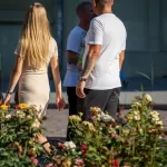 Фото тату на предплечье мужчины, с детально проработанным рисунком. Видны элементы растительного орнамента и геометрические фигуры.