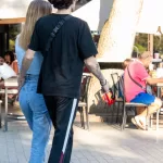 Тату девочки в школьной форме на руке парня - Уличная тату (street tattoo) № 14–210821 2