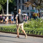 Тату пальма и солнце – красный круг на левой икре парня - Уличная тату (street tattoo) № 14–210821 1