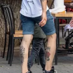 Тату руны и мультяшный персонаж со скейтом на ноге парня - Уличная тату (street tattoo) № 14–210821 6