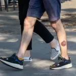 Тату рыжее животное и спираль внизу ноги парня - Уличная тату (street tattoo) № 14–210821 1