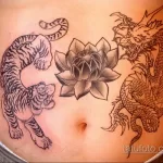 Фото тату лотоса на животе 07.08.2021 №010 - lotus tattoo on stomach - tatufoto.com