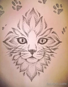 Фото тату, выполненное в технике pointillism, изображает морду кошки, составленную из множества точек. Стиль минималистичный, черно-белый.