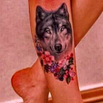 Фото рисунка тату волк на ноге 16.12.2021 №0009 - Wolf tattoo - tatufoto.com