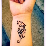 Фото рисунка тату волк на руке 16.12.2021 №0013 - Wolf tattoo - tatufoto.com