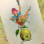 Цветное фото тату девушки, сидящей на лимоне. Необычный и креативный рисунок с элементами графики и акварели.