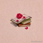 Красивый эскиз тату с изображением раскрытой книги и красной розы. Идеально подходит для любителей литературы и романтики.
