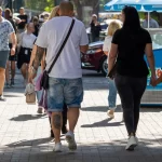 Фото тату на икре мужчины, изображающее реалистичный рисунок, вероятно, животного или мифического существа. Татуировка выполнена в темных тонах.