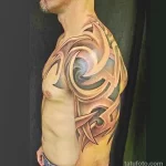 Фото тату трайбл на плече 23.02.22 №0015 - tribal tattoo tatufoto.com