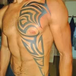 Фото трайбл тату грудь 23.02.22 №0004 - tribal tattoo tatufoto.com