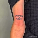 Фото тату: минималистичная надпись 'Whatever I Want' на руке, выполненная простым шрифтом в черном цвете.