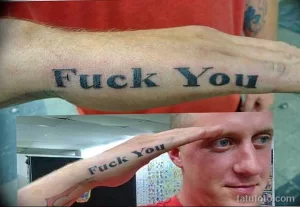 Фотография татуировки с надписью "Fuck You" на руке. Провокационная и вызывающая татуировка, выражающая негативные эмоции.