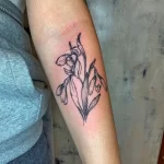 Фото тату цветок подснежника 19.04.22 №0059 - snowdrop flower tattoo tatufoto.com