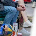 Большая цветная тату с цветами на левой ноге девушки 11