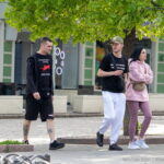 Тату автомат Калашникова и надписи на руке парня 9