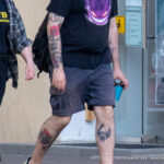 Тату фотоаппарат и подкова на ноге парня -Уличная тату-street tattoo-24052022-tatufoto.com 4