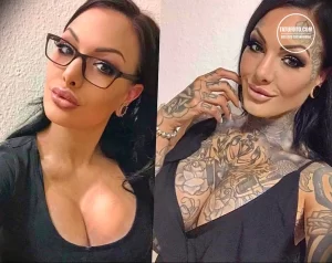 Фотография девушки в очках с множеством татуировок на руках и шее, демонстрирующая современный стиль и индивидуальность.
