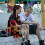 молодая девушка с татуировкой сюжетом из японского аниме на ноге06 - Уличная тату 22062022 №212 - tatufoto.com