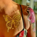 Фото пример золотистой татуировки золотом 07.09.22 №0031 - tatufoto.com